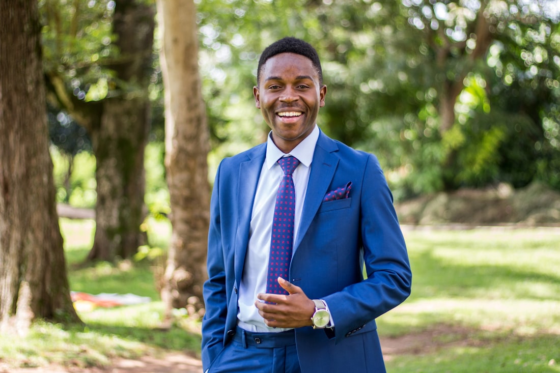 A confident entrepreneur in a suit, smiling